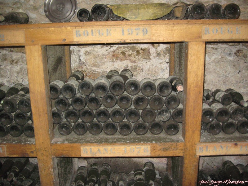 Historic bottles of wine in a cellar